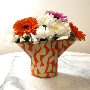 SHC127 -Small double spouted vase -orange with cobalt interior 12cm tall x 11cm wide